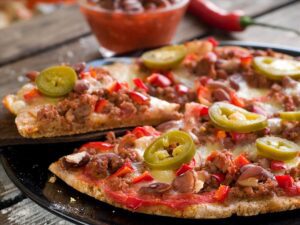 Mexican style pizza was created in Baja California, Mexico